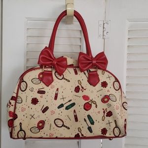 Cosmetics print handbag